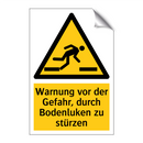 Warnung vor der Gefahr, durch Bodenluken zu stürzen